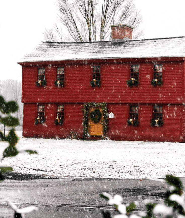 red barn with wreath